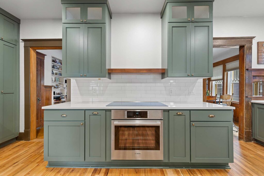 Beautifully remodeled kitchen with new range, oven, and cabinets.